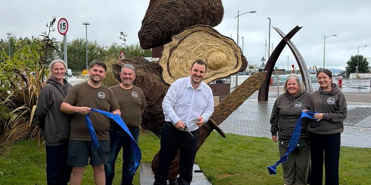 Oyster sculpture ribbon cutting 