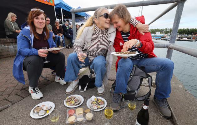 Enjoying oysters and prosecco at the waterfront