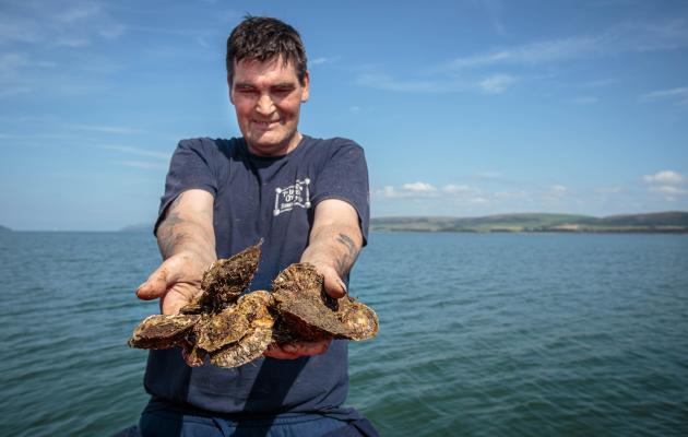 John Mills with Loch Ryan Native Oysters